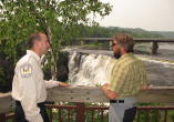 park warden and man standing in front of Kakabeka falls